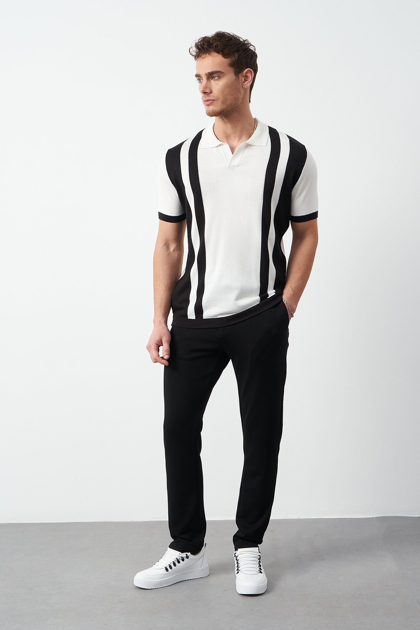 Oversized polo shirt black worn by model - Men's striped knit polo by Mesfeno Wear