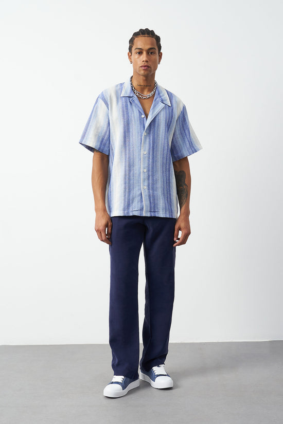 Light blue Cuban collar shirt on model, oversized fit striped camp collar design MSFN-212