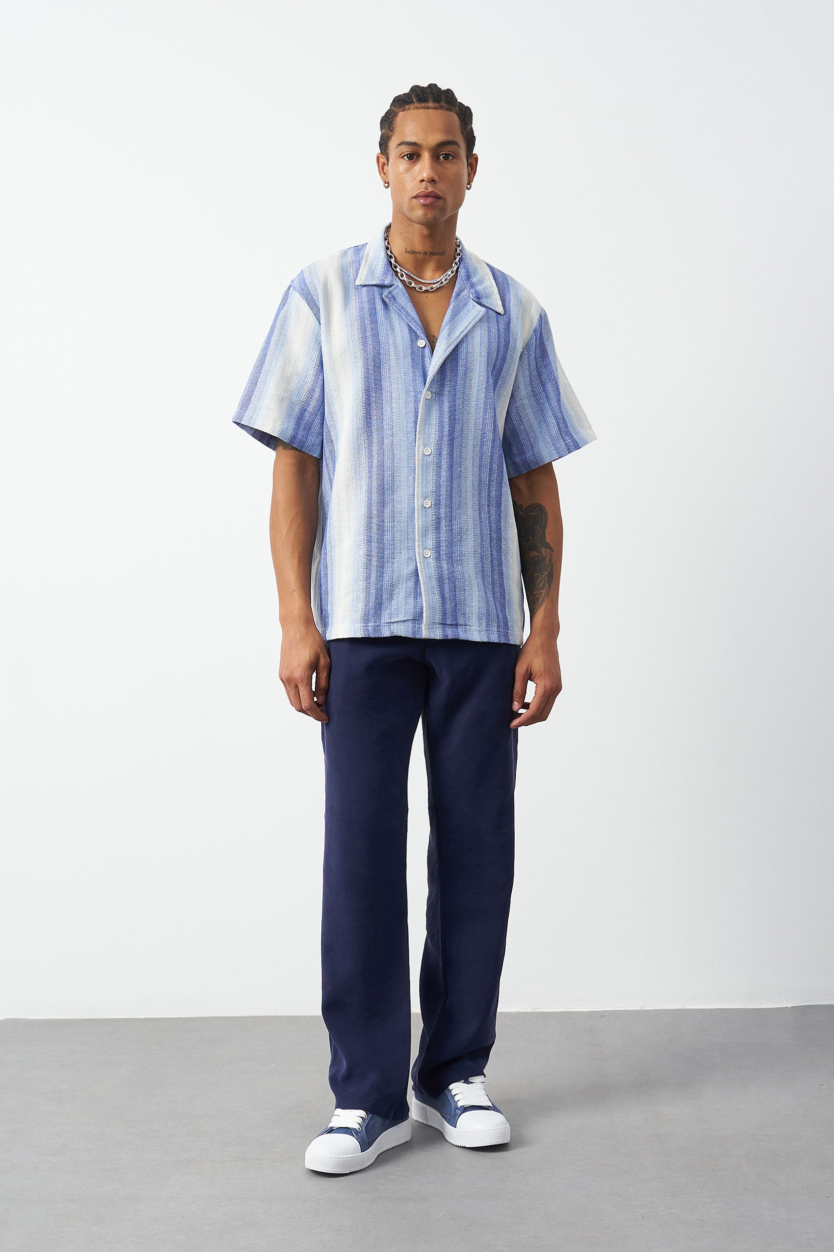 Light blue Cuban collar shirt on model, oversized fit striped camp collar design MSFN-212