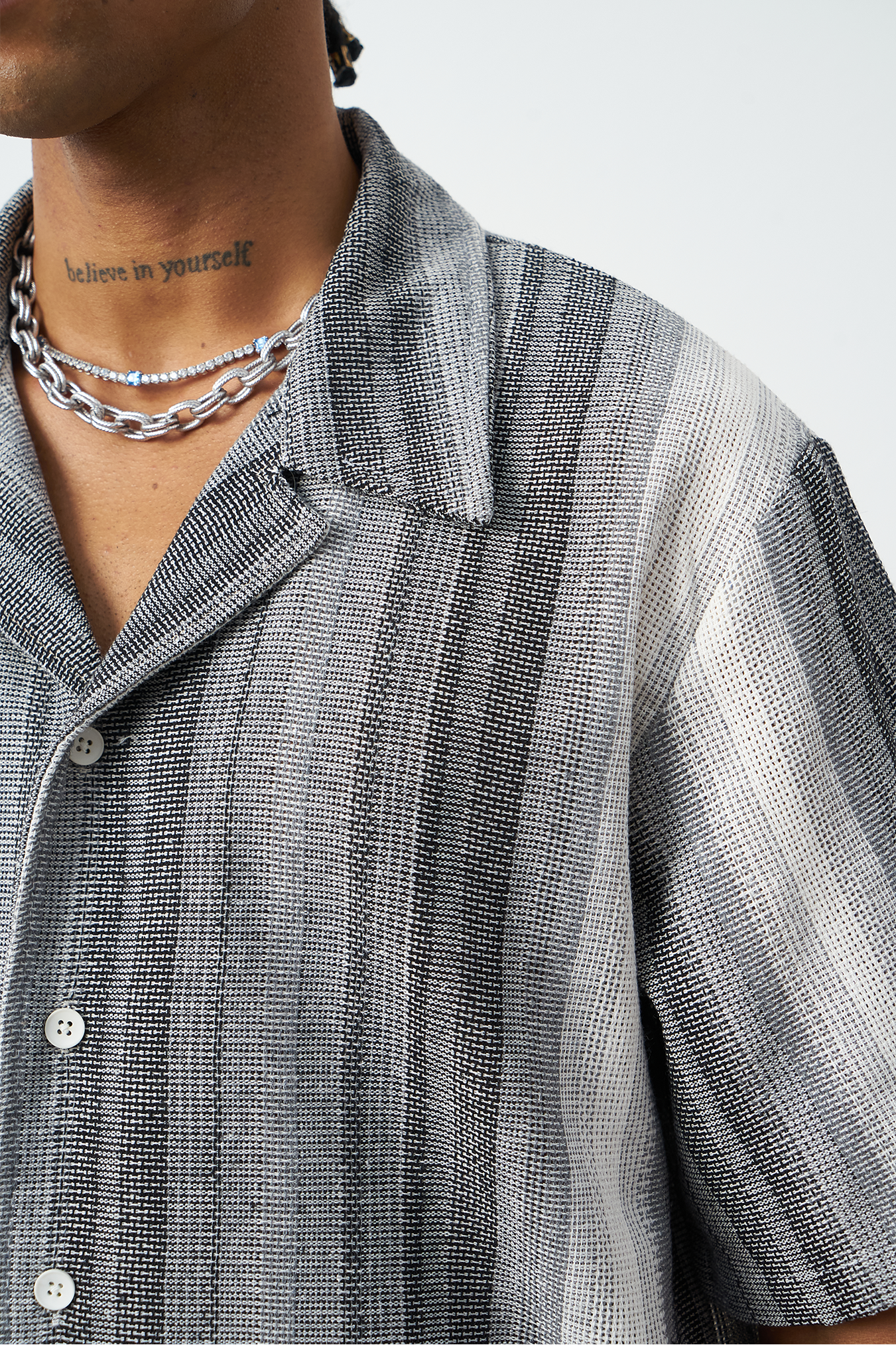 Back view of gray Cuban collar oversized shirt, premium striped camp collar design