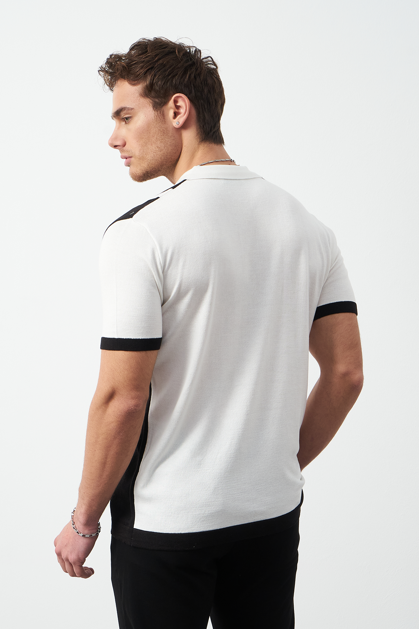 Oversized polo shirt styled with gray pants - Black streetwear polo by Mesfeno Wear