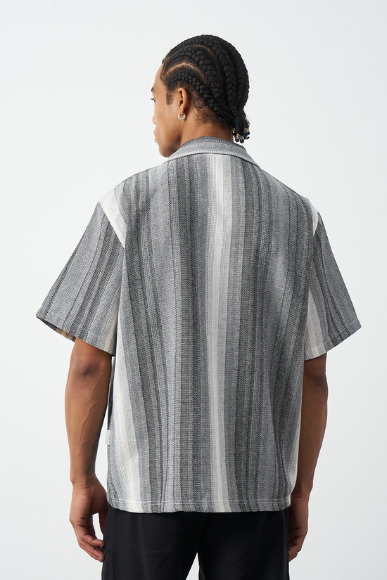 Gray Cuban collar shirt styled casually, oversized striped camp collar for summer wear