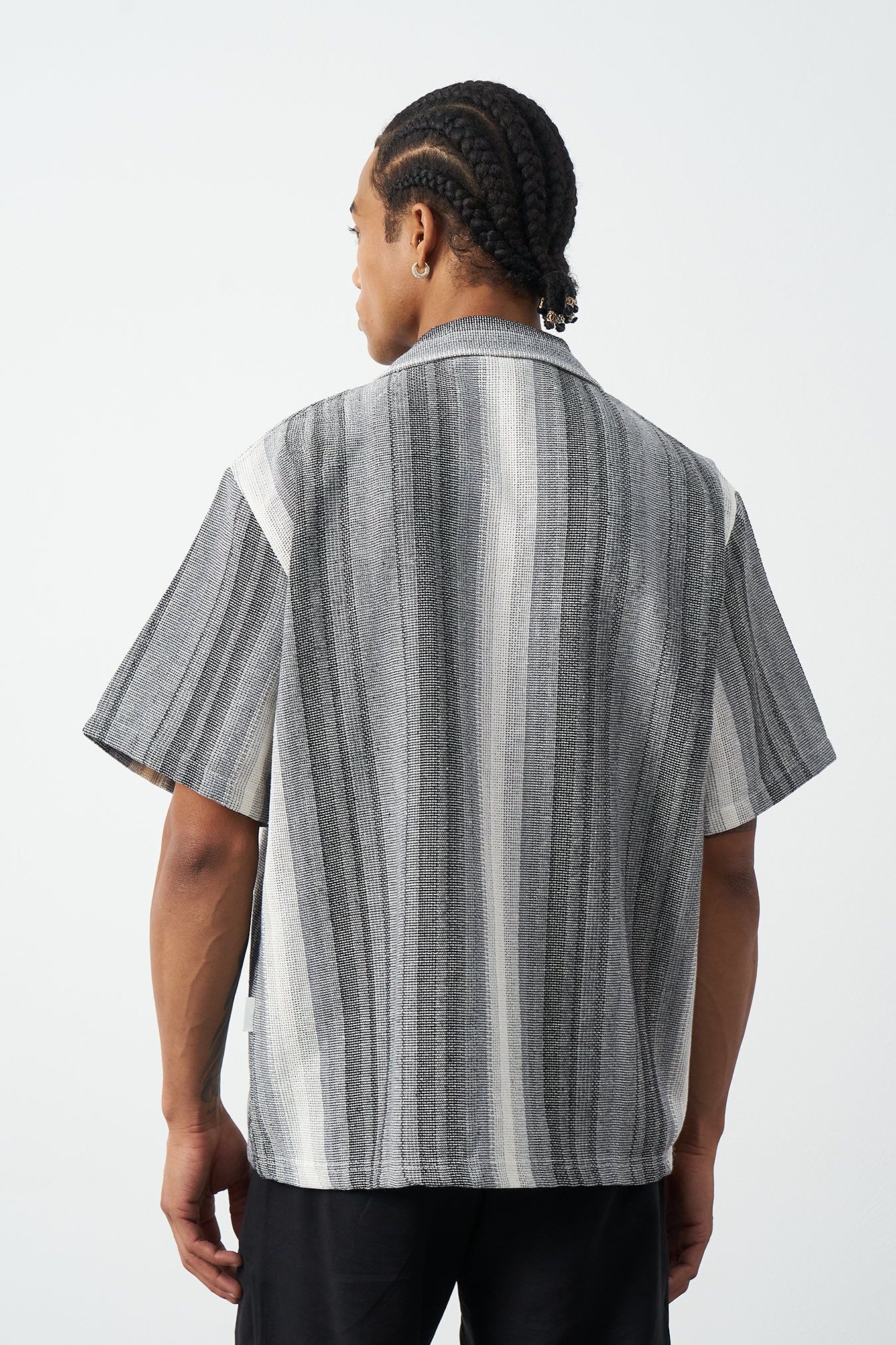 Gray Cuban collar shirt styled casually, oversized striped camp collar for summer wear