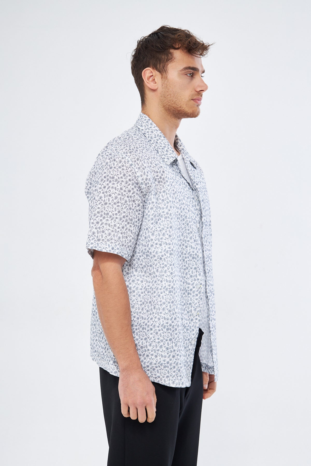 Palm print casual button down shirt on model, oversized Cuban collar viscose quality Mesfeno