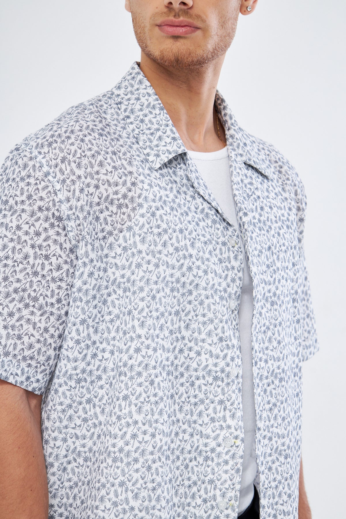 Palm casual button down shirt fabric texture, premium viscose Cuban collar tropical print detail