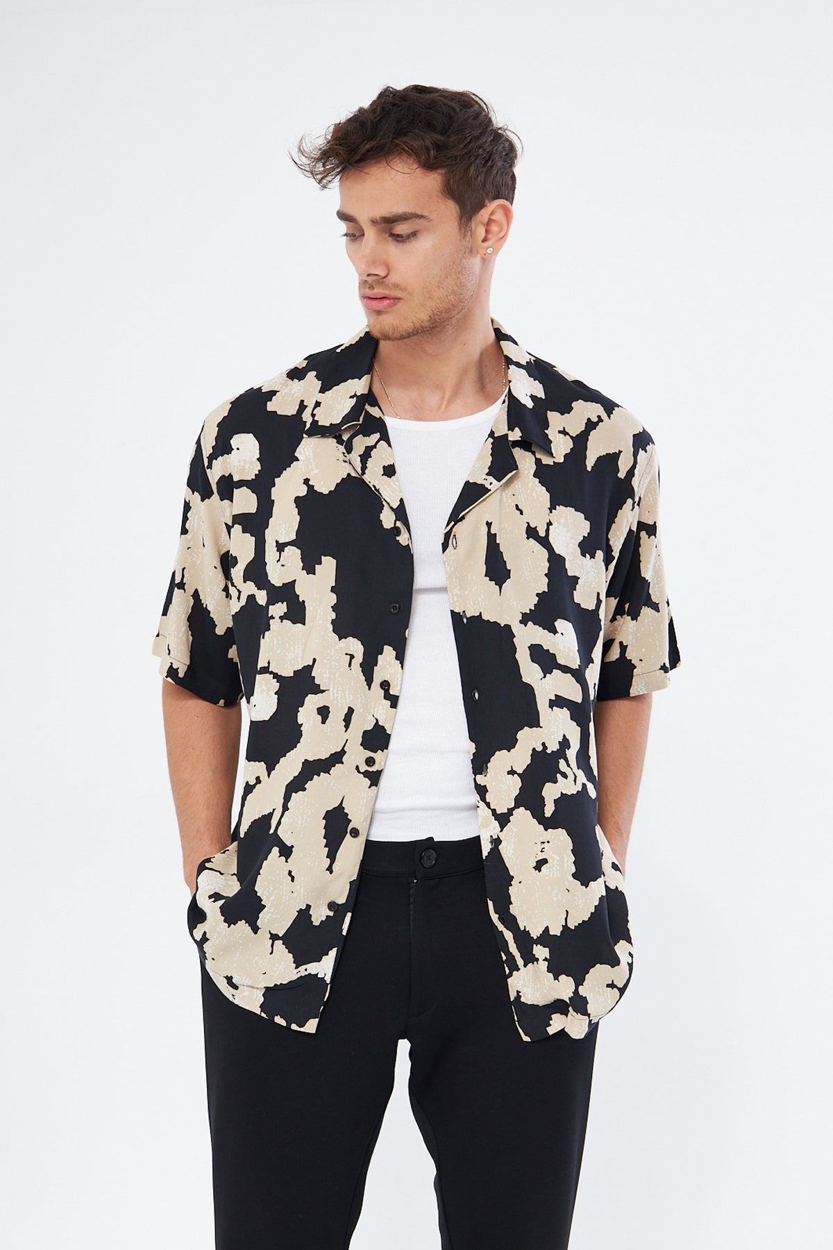 Side view ecru casual button down shirt, oversized fit Cuban collar modern subtle print men